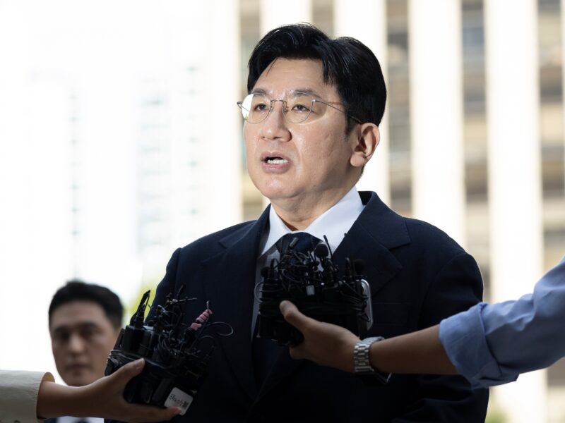 Why Police Are Seeking to Arrest the Billionaire K-Pop Mogul Behind BTS