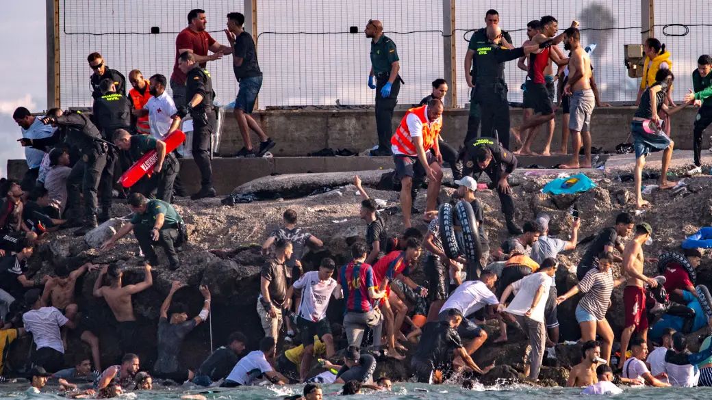 Nearly 49,000 Migrants Enter Spain's Ceuta Enclave in 24 Hours, Triggering Humanitarian and Security Crisis